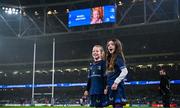 13 January 2024; Match day mascots Mabel Keating, aged seven, left, and Lauren Barrett, aged eight, spot themselves on the big screen before the Investec Champions Cup Pool 4 Round 3 match between Leinster and Stade Francais at the Aviva Stadium in Dublin. Photo by Harry Murphy/Sportsfile