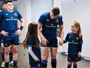 13 January 2024; Leinster captain Garry Ringrose with match day mascots Lauren Barrett, aged eight, and Mabel Keating, aged seven before the Investec Champions Cup Pool 4 Round 3 match between Leinster and Stade Francais at the Aviva Stadium in Dublin. Photo by Harry Murphy/Sportsfile