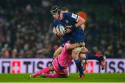 13 January 2024; James Ryan of Leinster is tackled by Ryan Chapuis of Stade Francais during the Investec Champions Cup Pool 4 Round 3 match between Leinster and Stade Francais at the Aviva Stadium in Dublin. Photo by Seb Daly/Sportsfile