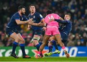 13 January 2024; Peniasi Dakuwaqa of Stade Francais is tackled by Sam Prendergast of Leinster during the Investec Champions Cup Pool 4 Round 3 match between Leinster and Stade Francais at the Aviva Stadium in Dublin. Photo by Seb Daly/Sportsfile