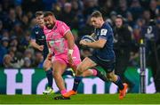 13 January 2024; Jordan Larmour of Leinster on his way to scoring his side's seventh try during the Investec Champions Cup Pool 4 Round 3 match between Leinster and Stade Francais at the Aviva Stadium in Dublin. Photo by Seb Daly/Sportsfile