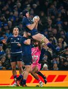13 January 2024; Ryan Baird of Leinster, lifted by teammate Dan Sheehan, during the Investec Champions Cup Pool 4 Round 3 match between Leinster and Stade Francais at the Aviva Stadium in Dublin. Photo by Seb Daly/Sportsfile