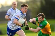 14 January 2024; Kevin Sheridan of Monaghan in action against Jeaic McKelvey of Donegal during the Dr McKenna Cup semi-final match between Monaghan and Donegal at Castleblayney in Monaghan. Photo by Ramsey Cardy/Sportsfile