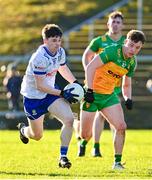 14 January 2024; Stephen O'Hanlon of Monaghan in action against Odhran Doherty of Donegal during the Dr McKenna Cup semi-final match between Monaghan and Donegal at Castleblayney in Monaghan. Photo by Ramsey Cardy/Sportsfile