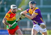 14 January 2024; Chris Nolan of Carlow in action against Jack O'Connor of Wexford during the Dioralyte Walsh Cup Round 3 match between Wexford and Carlow at Chadwicks Wexford Park in Wexford. Photo by Tyler Miller/Sportsfile