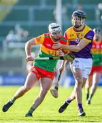 14 January 2024; Chris Nolan of Carlow in action against Jack O'Connor of Wexford during the Dioralyte Walsh Cup Round 3 match between Wexford and Carlow at Chadwicks Wexford Park in Wexford. Photo by Tyler Miller/Sportsfile
