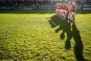 14 January 2024; Cork players stand for the playing of Amhrán na bhFiann before the Co-Op Superstores Munster Hurling League Group A match between Cork and Clare at Páirc Uí Rinn in Cork.  Photo by Eóin Noonan/Sportsfile