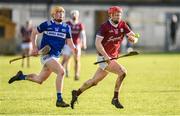 14 January 2024; Tom Monaghan of Galway and Tom Cuddy of Laois during the Dioralyte Walsh Cup Round 3 match between Galway and Laois at Duggan Park in Ballinasloe, Galway. Photo by Seb Daly/Sportsfile