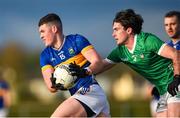 14 January 2024; Seán O'Connor of Tipperary is tackled by Colm Mc Sweeney of Limerick during the McGrath Cup Group A match between Tipperary and Limerick at Templetuohy GAA Pitch in Templetuohy, Tipperary. Photo by Tom Beary/Sportsfile
