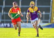 14 January 2024; Tomás Kinsella of Wexford in action against Jack McCullagh of Carlow during the Dioralyte Walsh Cup Round 3 match between Wexford and Carlow at Chadwicks Wexford Park in Wexford. Photo by Tyler Miller/Sportsfile