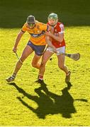 14 January 2024; Cathal Malone of Clare in action against Brian Roche of Cork during the Co-Op Superstores Munster Hurling League Group A match between Cork and Clare at Páirc Uí Rinn in Cork.  Photo by Eóin Noonan/Sportsfile