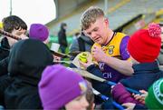 14 January 2024; Cian Byrne of Wexford signs autographs after the Dioralyte Walsh Cup Round 3 match between Wexford and Carlow at Chadwicks Wexford Park in Wexford. Photo by Tyler Miller/Sportsfile
