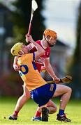 14 January 2024; Paddy Donnellan of Clare is tackled by Darragh Flynn of Cork during the Co-Op Superstores Munster Hurling League Group A match between Cork and Clare at Páirc Uí Rinn in Cork.  Photo by Eóin Noonan/Sportsfile