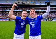 14 January 2024; Avra players Finbar McAvinu, left, and Thomas Brady celebrate after their side's victory in the AIB GAA Football All-Ireland Junior Club Championship final match between Arva of Cavan and Listowel Emmets of Kerry at Croke Park in Dublin. Photo by Piaras Ó Mídheach/Sportsfile