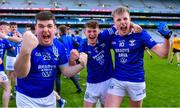 14 January 2024; Arva players, from left, Shane Corcoran, Charlie Madden and Thomas Partington celebrate after their side's victory in the AIB GAA Football All-Ireland Junior Club Championship final match between Arva of Cavan and Listowel Emmets of Kerry at Croke Park in Dublin. Photo by Piaras Ó Mídheach/Sportsfile