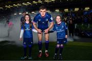 13 January 2024; Match day mascots Lauren Barrett, aged eight, left, and Mabel Keating, aged seven, with Leinster co-captain Garry Ringrose before the Investec Champions Cup Pool 4 Round 3 match between Leinster and Stade Francais at the Aviva Stadium in Dublin. Photo by Sam Barnes/Sportsfile