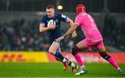 13 January 2024; Ciarán Frawley of Leinster in action against Mathieu Hirigoyen of Stade Francais during the Investec Champions Cup Pool 4 Round 3 match between Leinster and Stade Francais at the Aviva Stadium in Dublin. Photo by Sam Barnes/Sportsfile