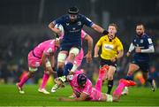 13 January 2024; Caelan Doris of Leinster in action against Pierre-Henri Azagoh of Stade Francais during the Investec Champions Cup Pool 4 Round 3 match between Leinster and Stade Francais at the Aviva Stadium in Dublin. Photo by Sam Barnes/Sportsfile