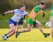 14 January 2024; John Ross Molloy of Donegal in action against Darragh Treanor of Monaghan during the Dr McKenna Cup semi-final match between Monaghan and Donegal at Castleblayney in Monaghan. Photo by Ramsey Cardy/Sportsfile