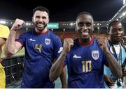 14 January 2024; Cape Verde players Roberto Lopes, left, and Jamiro Monteiro celebrate after their side's victory in the TotalEnergies CAF Africa Cup of Nations match between Ghana and Cape Verde at Stade Félix-Houphouët-Boigny, Abidjan, Côte d'Ivoire. Photo by Sergio Bisi/Sportsfile