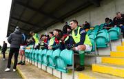 14 January 2024; Limerick substitutes including Daniel Daly, right, sit in the stand before the McGrath Cup Group A match between Tipperary and Limerick at Templetuohy GAA Pitch in Templetuohy, Tipperary. Photo by Tom Beary/Sportsfile