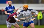 14 January 2024; Laois goalkeeper Enda Rowland in action against Declan McLoughlin during the Dioralyte Walsh Cup Round 3 match between Galway and Laois at Duggan Park in Ballinasloe, Galway. Photo by Seb Daly/Sportsfile