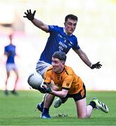 14 January 2024; Jamie McVeigh of Listowel Emmets is tackled by Finbar McAbinue of Arva during the AIB GAA Football All-Ireland Junior Club Championship final match between Arva of Cavan and Listowel Emmets of Kerry at Croke Park in Dublin. Photo by Ben McShane/Sportsfile