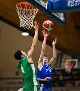 15 January 2024; Augustine Farrell of Coláiste Eanna scores a lay-up despite the efforts of Layden O'Neill of St Malachy’s College during the Pinergy Basketball Ireland U16 A Boys Schools Cup Final match between St Malachy’s College, Belfast, and Coláiste Eanna, Dublin at the National Basketball Arena in Tallaght, Dublin. Photo by Ben McShane/Sportsfile