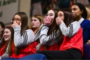15 January 2024; Mungret Community College supporters react during the Pinergy Basketball Ireland U16 A Girls Schools Cup Final match between Our Lady and St Patrick's College Knock, Belfast, and Mungret Community College, Limerick at the National Basketball Arena in Tallaght, Dublin. Photo by Ben McShane/Sportsfile