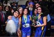 15 January 2024; Zariah Faapito, left, with her sister, and St Mary's College Dundalk captain Elahna Faapito celebrate with the cup and family members, from left, Jediah, Cathy Nolan, Fu, Trina and Elijah Faapito after their side's victory in the Pinergy Basketball Ireland U19 B Girls Schools Cup Final match between St. Mary’s College, Dundalk, Louth, and Colaiste Ide, Dingle, Kerry at the National Basketball Arena in Tallaght, Dublin. Photo by Ben McShane/Sportsfile