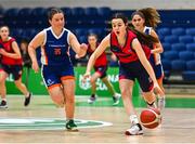 16 January 2024; Saoirse O'Donnell of Coláiste Na Carraige in action against Cleo Hennigan of St Andrew's College during the Pinergy Basketball Ireland U16B Girls Schools Cup Final match between Coláiste Na Carraige, Donegal and St Andrew's College, Dublin, at National Basketball Arena in Tallaght, Dublin. Photo by Tyler Miller/Sportsfile
