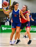 16 January 2024; Abi Lyons of St Andrew's College /in action against Emma Diver of Coláiste Na Carraige during the Pinergy Basketball Ireland U16B Girls Schools Cup Final match between Coláiste Na Carraige, Donegal and St Andrew's College, Dublin, at National Basketball Arena in Tallaght, Dublin. Photo by Tyler Miller/Sportsfile