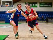 16 January 2024; Laura Boyle of Coláiste Na Carraige in action against Cleo Hennigan of St Andrew's College during the Pinergy Basketball Ireland U16B Girls Schools Cup Final match between Coláiste Na Carraige, Donegal and St Andrew's College, Dublin, at National Basketball Arena in Tallaght, Dublin. Photo by Tyler Miller/Sportsfile