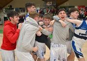 16 January 2024; The St Brendan’s College Belmullet side players celebrate after their side's victory during the Pinergy Basketball Ireland U19C Boys Schools Cup Final match between St Brendan’s College Belmullet, Mayo and Midleton at National Basketball Arena in Tallaght, Dublin. Photo by Tyler Miller/Sportsfile