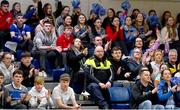 16 January 2024; A member of the An Garda Síochána watches on from the stands during the Pinergy Basketball Ireland U19C Boys Schools Cup Final match between St Brendan’s College Belmullet, Mayo and Midleton at National Basketball Arena in Tallaght, Dublin. Photo by Tyler Miller/Sportsfile