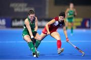 16 January 2024; Roisin Upton of Ireland in action against Seungae Park of Korea Republic during the FIH Women's Olympic Hockey Qualifying Tournament Pool A match between Ireland and Korea Republic at Campo de Hockey Hierba Tarongers in Valencia, Spain. Photo by Manuel Queimadelos/Sportsfile