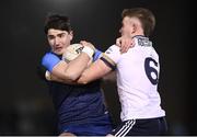 16 January 2024; Diarmuid Moriarty of UCD is tackled by Ryan Magill of Ulster University during the Electric Ireland Higher Education GAA Sigerson Cup Round 2 match between UCD and Ulster University at Dave Billings Park in Belfield, Dublin. Photo by Harry Murphy/Sportsfile