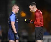 16 January 2024; Referee Andrew Smith speak to Kieran Kennedy of UCD before showing him a red card during the Electric Ireland Higher Education GAA Sigerson Cup Round 2 match between UCD and Ulster University at Dave Billings Park in Belfield, Dublin. Photo by Harry Murphy/Sportsfile