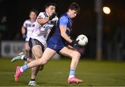 16 January 2024; Sam Callinan of UCD in action against Ben McCarron of Ulster University during the Electric Ireland Higher Education GAA Sigerson Cup Round 2 match between UCD and Ulster University at Dave Billings Park in Belfield, Dublin. Photo by Harry Murphy/Sportsfile