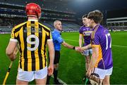 13 January 2024; Referee Colm McDonald with Tullogher Rosbercon captain Colman O'Sullivan and St Catherine's joint-captains Eoghan O'Riordan, 3, and Conor Hegarty before the AIB GAA Hurling All-Ireland Junior Club Championship final match between St Catherine's of Cork and Tullogher Rosbercon of Kilkenny at Croke Park in Dublin. Photo by Piaras Ó Mídheach/Sportsfile