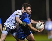 16 January 2024; Sean Coffey of UCD is tackled by Danny Fullerton of Ulster University during the Electric Ireland Higher Education GAA Sigerson Cup Round 2 match between UCD and Ulster University at Dave Billings Park in Belfield, Dublin. Photo by Harry Murphy/Sportsfile