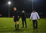 18 January 2024; Referee Matthew Redmond, linesman Ciaran Flynn and umpire Henry Barrett inspect the pitch before the Electric Ireland Higher Education GAA Fitzgibbon Cup Round 1 match between DCU Dóchas Éireann and SETU Waterford at DCU Sportsgrounds in Dublin. Photo by Stephen Marken/Sportsfile
