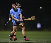 18 January 2024; Patrick Fitzgerald of SETU Waterford in action against Sam Bourke of DCU during the Electric Ireland Higher Education GAA Fitzgibbon Cup Round 1 match between DCU Dóchas Éireann and SETU Waterford at DCU Sportsgrounds in Dublin. Photo by Stephen Marken/Sportsfile