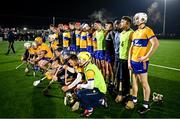 10 January 2024; Clare players pose for a squad photo before the Co-Op Superstores Munster Hurling League Group A match between Clare and Limerick at Clarecastle GAA astro pitch in Clare. Photo by Piaras Ó Mídheach/Sportsfile