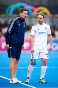 19 January 2024; Ireland assistant coach Neville Rothman talks with Tim Cross of Ireland during the FIH Men's Olympic Hockey Qualifying Tournament semi-final match between Ireland and Spain at Campo de Hockey Hierba Tarongers in Valencia, Spain. Photo by Manuel Queimadelos/Sportsfile