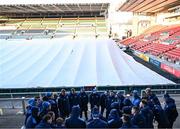 19 January 2024; Leinster players huddle during a Leinster Rugby captain's run as the pitch is covered with frost covers at Mattioli Woods Welford Road Stadium in Leicester, England. Photo by Harry Murphy/Sportsfile