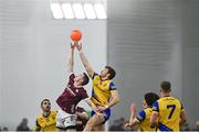 19 January 2024; Céin Darcy of Galway and Keith Doyle of Roscommon battle for possession during the Connacht FBD League final match between Roscommon and Galway at University of Galway Connacht GAA AirDome in Bekan, Mayo. Photo by Tyler Miller/Sportsfile