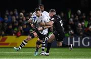 19 January 2024; Magnus Bradbury of Bristol Bears is tackled by JJ Hanrahan of Connacht during the Investec Champions Cup Pool 1 Round 4 match between Connacht and Bristol Bears at the Dexcom Stadium in Galway. Photo by Seb Daly/Sportsfile