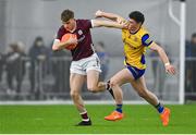 19 January 2024; Liam Costello of Galway evades the tackle of Patrick Gavin of Roscommon during the Connacht FBD League final match between Roscommon and Galway at University of Galway Connacht GAA AirDome in Bekan, Mayo. Photo by Tyler Miller/Sportsfile