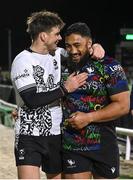 19 January 2024; Bundee Aki of Connacht, right, and AJ MacGinty of Bristol Bears after the Investec Champions Cup Pool 1 Round 4 match between Connacht and Bristol Bears at the Dexcom Stadium in Galway. Photo by Seb Daly/Sportsfile
